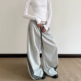 A PUEE American retro three bar splicing curved knife guard pants for men and women baggy wide leg loose sports casual pants