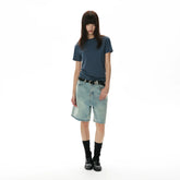 A PUEE summer vintage distressed washed light blue denim shorts for women with a lazy feeling, loose and versatile commuting cropped pants