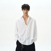 A PUEE American high street clean fit basic white long sleeved shirt for men and women with a sense of luxury and versatile drape shirt