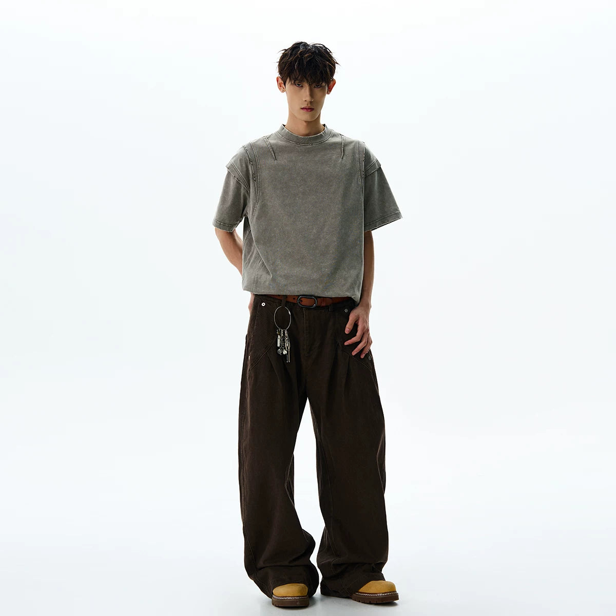 A PUEE American retro clean fit silhouette deconstruction cut to make old short sleeved T-shirt trendy and cool loose top
