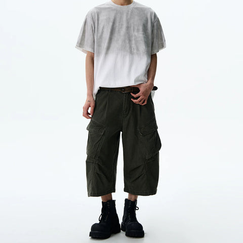 A PUEE American retro cleanfit multi pocket workwear shorts for men and women on the street, loose and versatile cropped pants for summer
