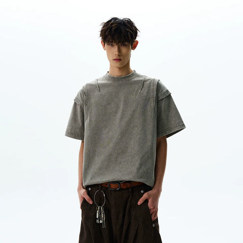 A PUEE American retro clean fit silhouette deconstruction cut to make old short sleeved T-shirt trendy and cool loose top
