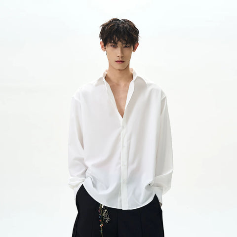 A PUEE American high street clean fit basic white long sleeved shirt for men and women with a sense of luxury and versatile drape shirt
